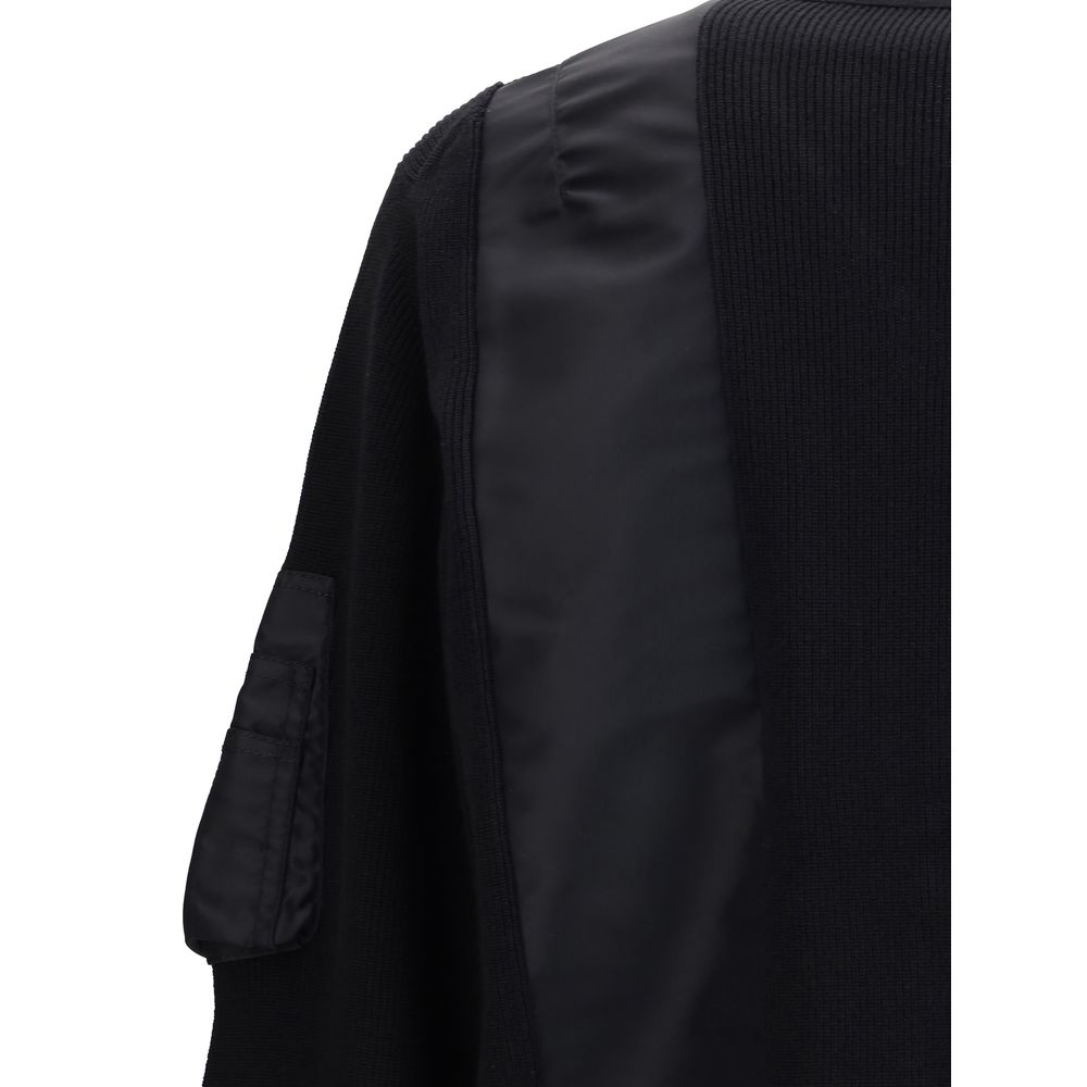 Front view with bag zipped and handles upright.