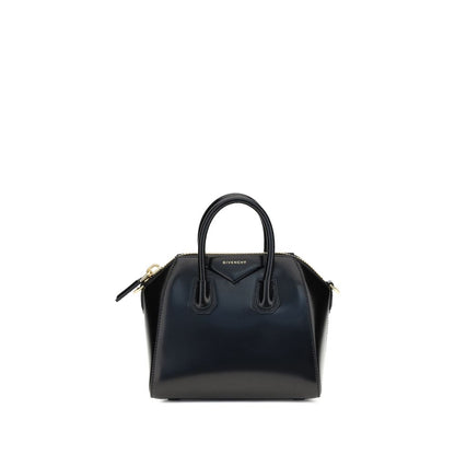 Givenchy Black Calf Leather Bos Taurus Handbag with geometric pattern, zipper closure, top handles, and shoulder strap.