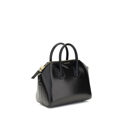 Givenchy Black Calf Leather Bos Taurus Handbag with glossy geometric design, top handles, and iconic monogram, AW25 collection.