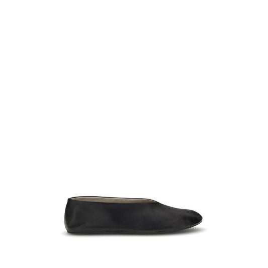 The Row Black Lamb Ovis Aries Aries Ballet Flats with tapered toe and sleek design, made from fine grained nappa leather.