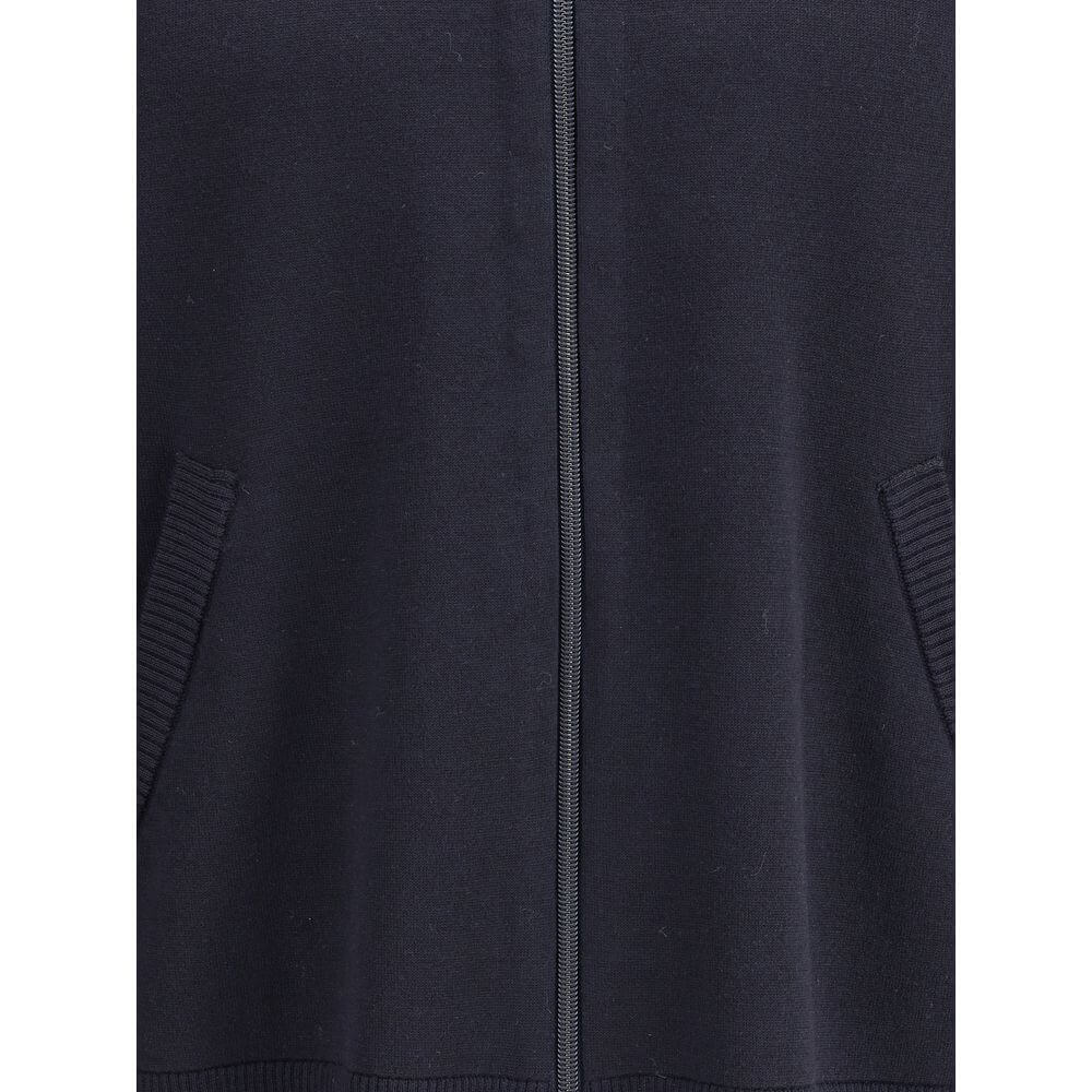 Close-up of Thom Browne Blue Fleece Wool Cardigan with front zipper and welt pockets, highlighting the ribbed detailing and elegant design.