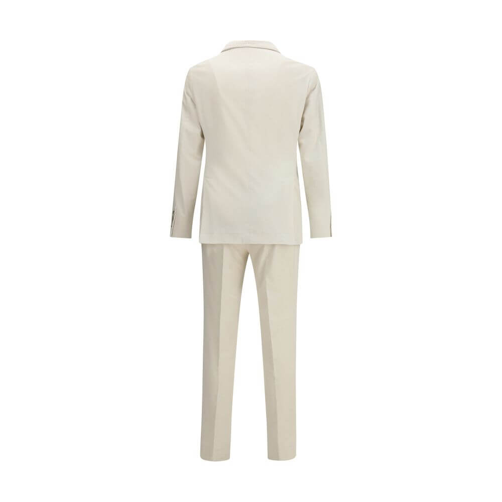 Back view of Brunello Cucinelli Cream Cotton Two-Piece Suit with blazer and trousers for elegant formal look in corduroy.
