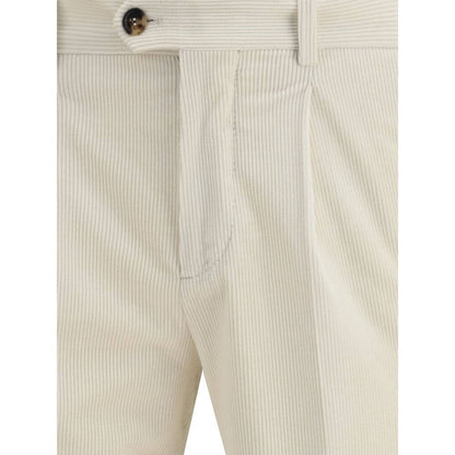 Close-up of Brunello Cucinelli Cream Cotton Two-Piece Suit trousers with zip and button closure, showing fine corduroy texture.