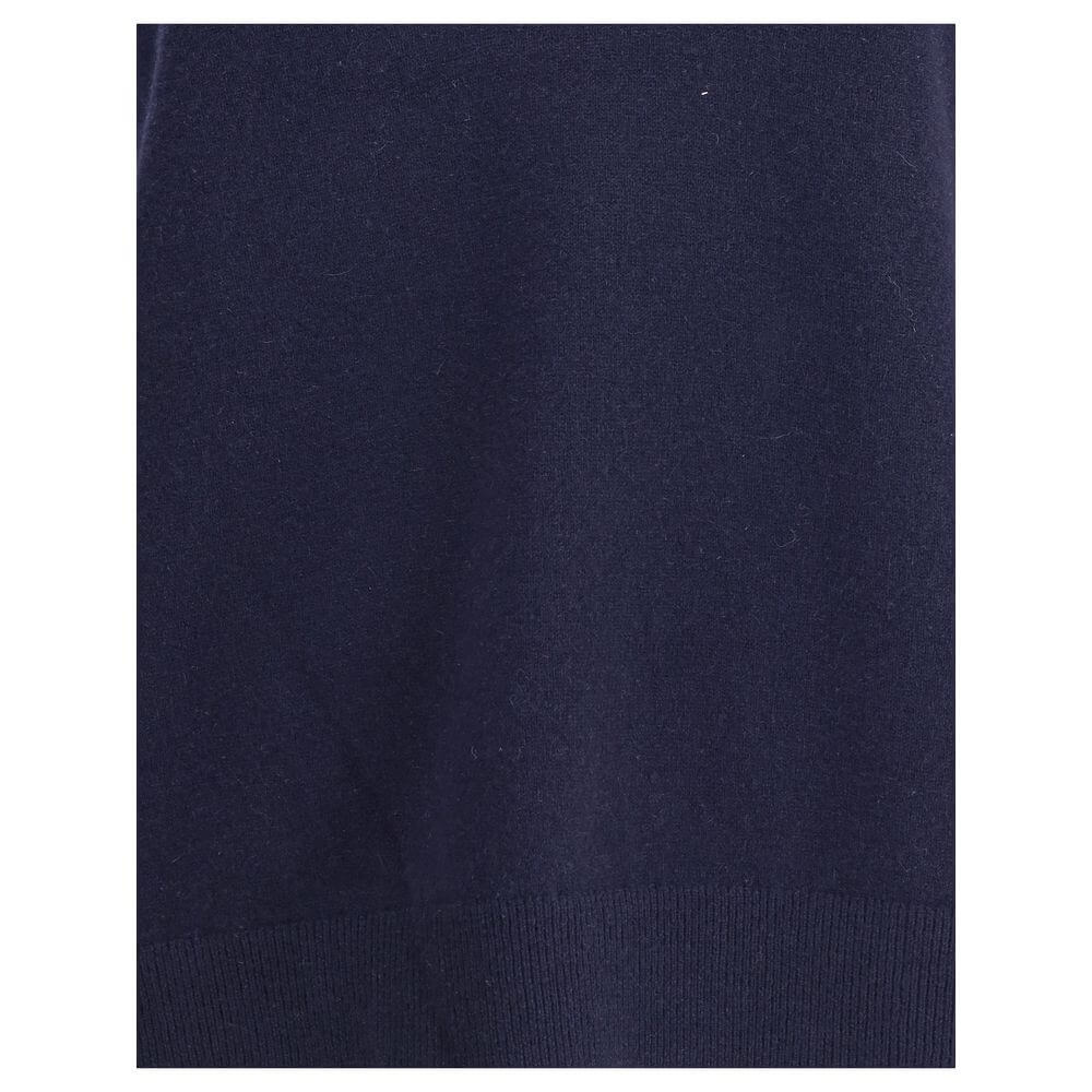 Extreme Cashmere Blue Cashmere Sleeveles Sweater with ribbed hem, showcasing the Lord Vest in a versatile AW25 design.