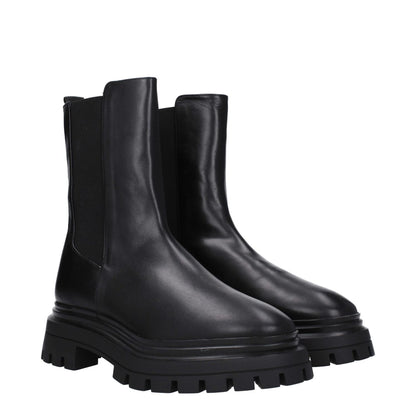 Stuart Weitzman Black Leather Ankle Boots with round toe, mid heels, and back logo, featuring rubber sole and 5.5 cm heel height.