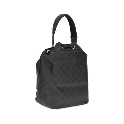 Gucci Black Polyamide Backet Bag with GG Supreme pattern, rigid handle, and drawstring closure, product for AW25 season.