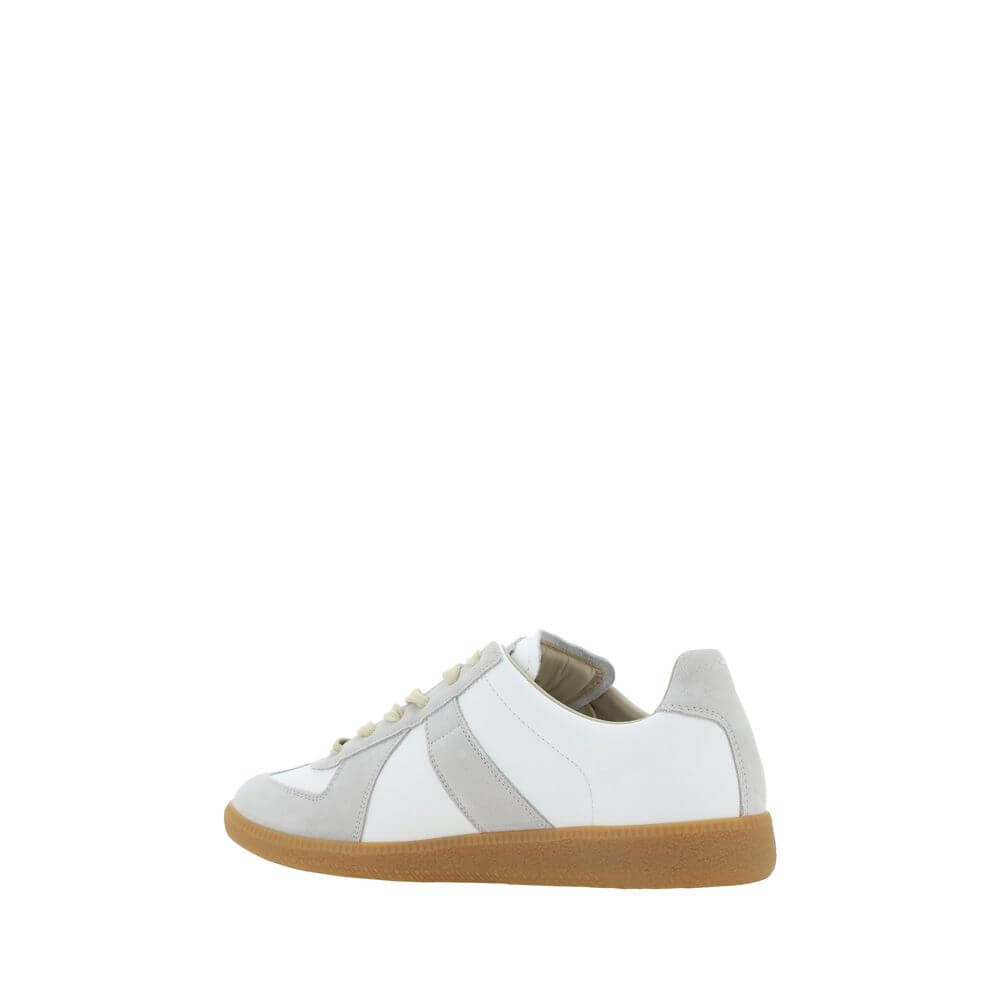 Side view of Margiela White Rubber Low Top Sneakers with suede detailing and gum sole.