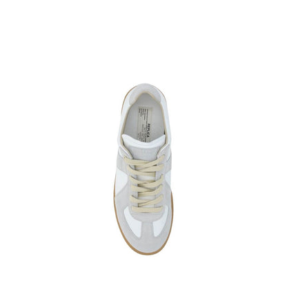 Top view of Margiela White Rubber Low Top Sneakers with suede detailing and contrasting gum sole, featuring a front logoed press-stud tab.