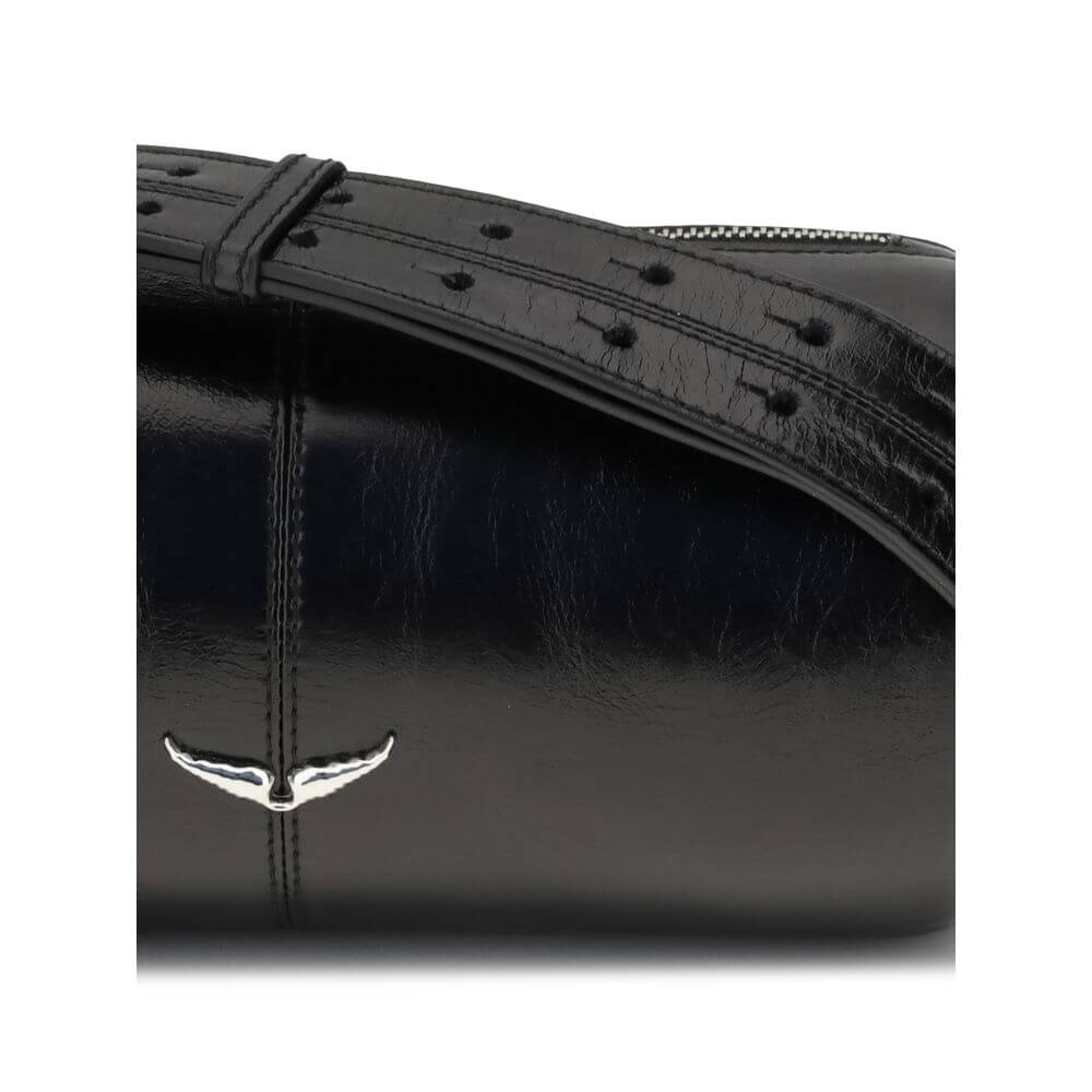 Close-up of Zadig & Voltaire Black Leather Shoulder Bag showing glossy finish and silver logo details.