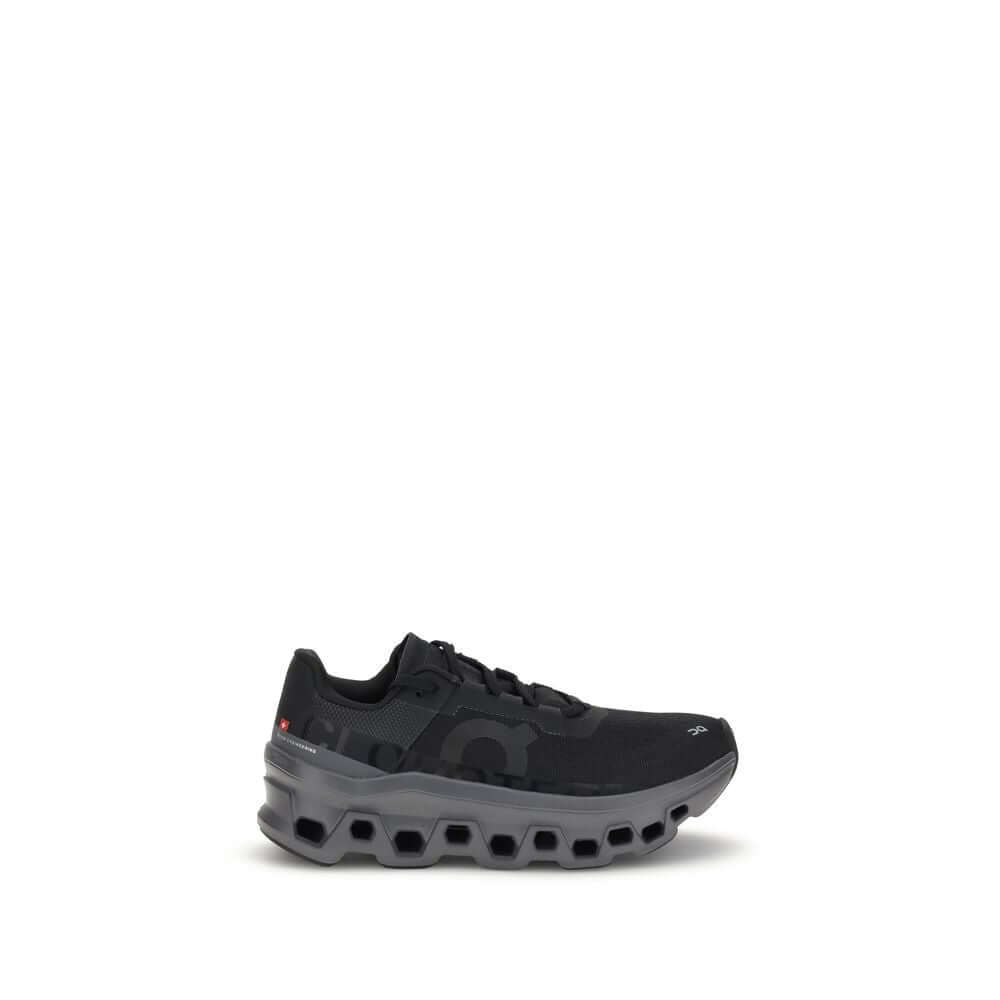ON Black Polyester Athletic Sneakers with perforated sole and logo on the side, offering secure fit and modern look.