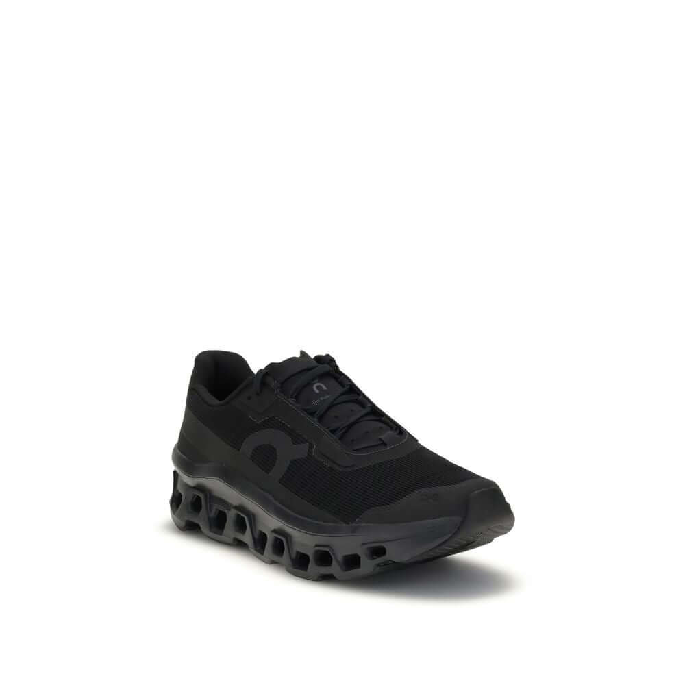 ON Black Recycled Polyester Athletic Sneakers with advanced cushioning and breathable mesh for optimal comfort and stability, side view.