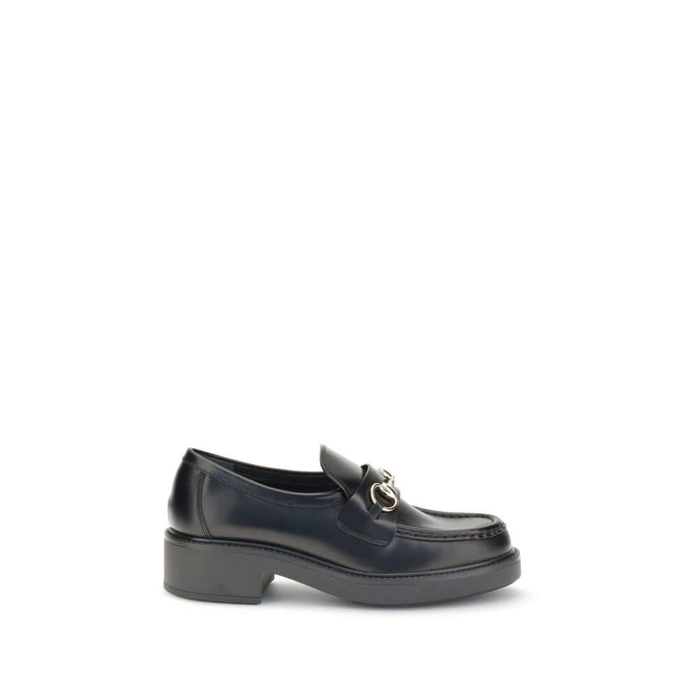Gucci Black Calf Leather Bos Taurus Slip-On Loafers with horsebit detail and block heel, perfect for formal and everyday style.