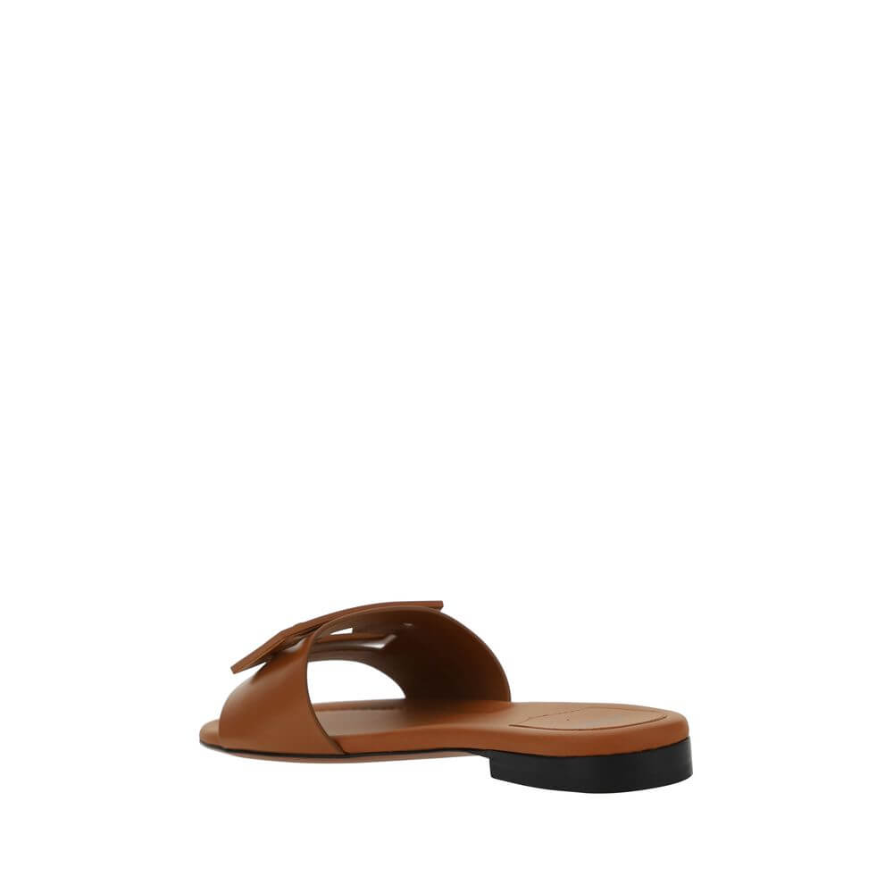 Fendi Brown Calf Leather Bos Taurus Flat Sandals with iconic FF logo, open toe, slip-on style, made in Italy AW25 collection.