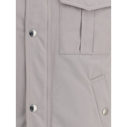 Detail view of Brunello Cucinelli White Polyamide Coat with snap-button closure and welt pockets.