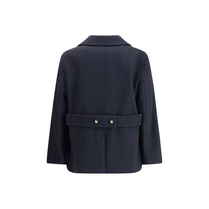 Back view of Valentino Blue Fleece Wool Coat featuring wide lapels and buttoned belt detailing for timeless elegance.