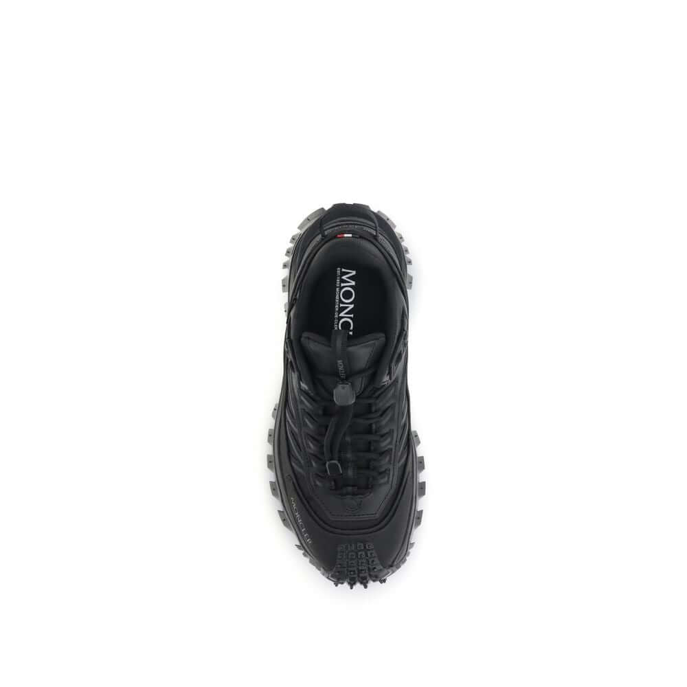 Top view of Moncler Black Calf Leather Bos Taurus Athletic Sneakers with puller and drawstring closure.