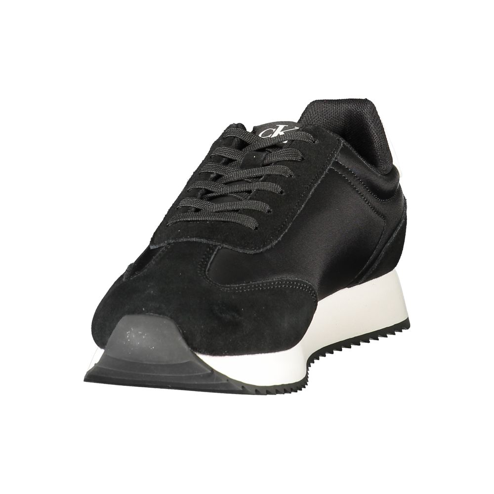 Calvin Klein Black Leather Men Sneaker with white accents and logo, showcasing sleek style and refined athleticism.
