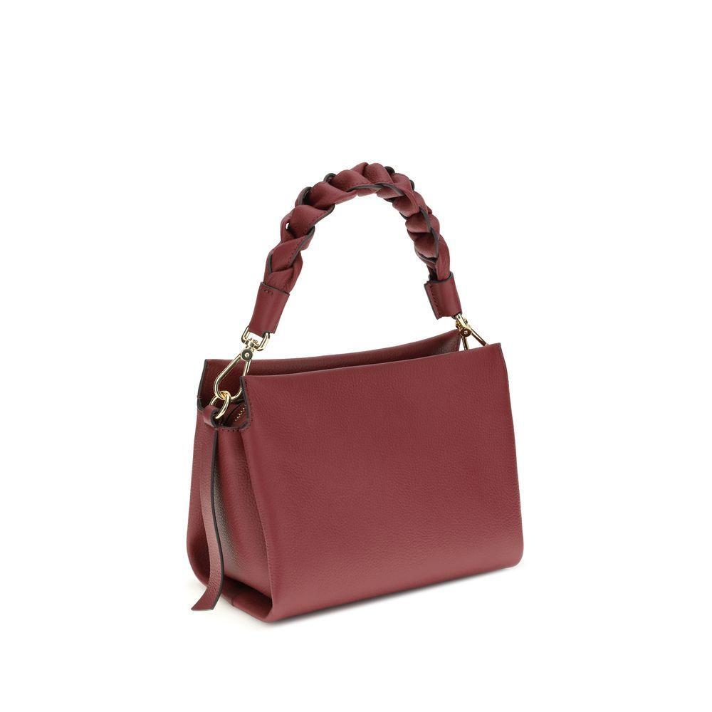 Front view with bag zipped and handles upright.
