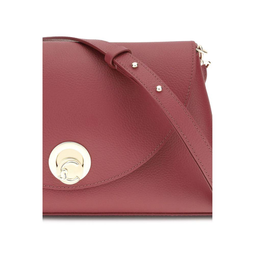 Front view with bag zipped and handles upright.