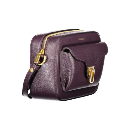 Coccinelle Purple Leather Women Handbag with adjustable strap, external twist closure pocket, and zip closure, showcasing Italian craftsmanship.