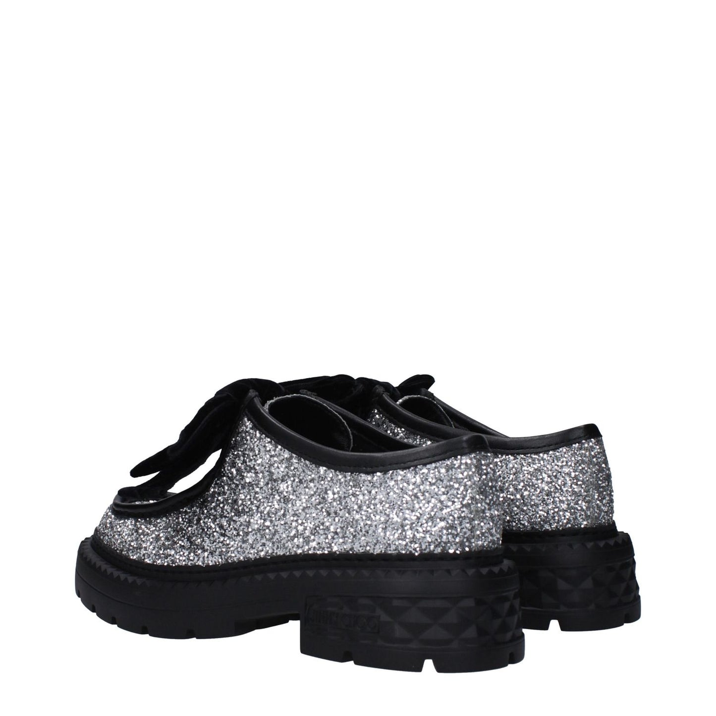 Jimmy Choo Gray Plastic Slip-On Loafers with glitter, round toe, mid heels, side logo, rubber sole, and punk rock style.