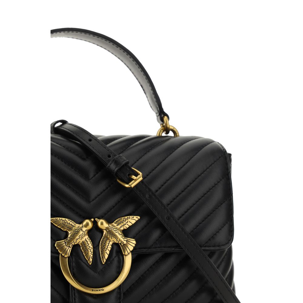 Front view with bag zipped and handles upright.
