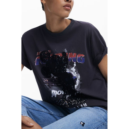 Woman wearing Desigual Black Cotton Women T-Shirt with Mickey Mouse and sequins design.