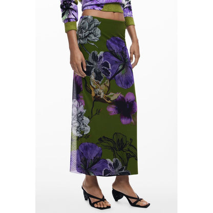 Desigual Green Polyester Women Skirt with floral tulle design and elastic waist, shown styled with floral print top and black sandals.