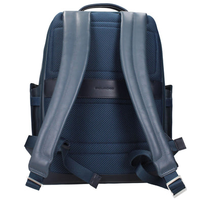 Back view of Piquadro Blue Leather Backpack with adjustable straps and logos, designed for vintage style and tech storage.