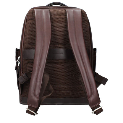 Back view of Piquadro Brown Leather Backpack with adjustable straps, showcasing vintage design and leather material.