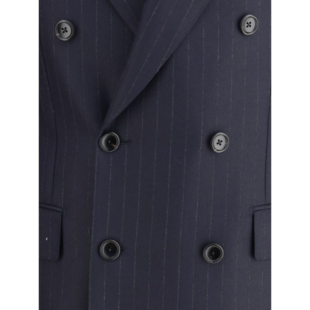 Close-up of Tom Ford Blue Wool Blazer featuring pinstripes, double-breasted buttons, and welt flap pockets.
