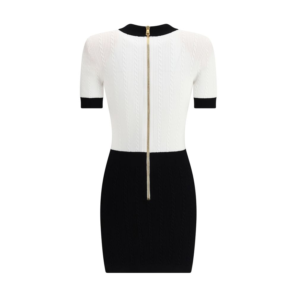 Back view of Balmain Multicolor Viscose Casual Dress with braided pattern and back zipper, featuring short sleeves in black and white.