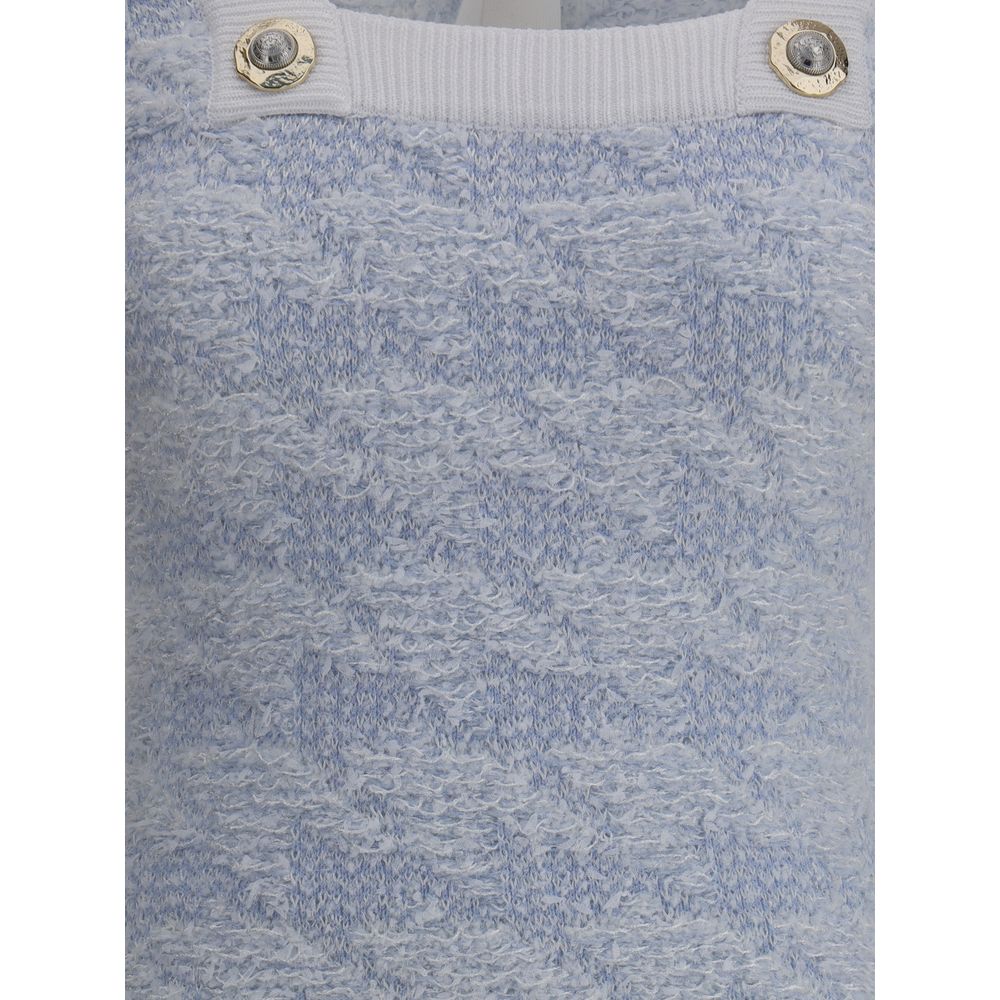 Close-up of Balmain Light Blue Polyamide Casual Dress with embossed button details, perfect for an elegant and sophisticated look.