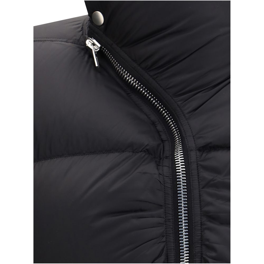 Close-up of Rick Owens Black Polyamide Jackets And Coat with quilted design and high collar zipper detail.