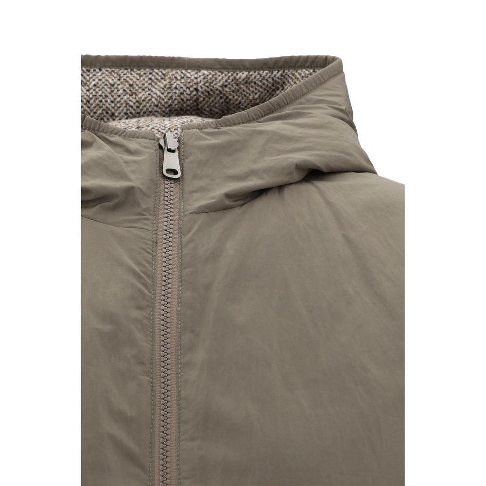 Close-up of Brunello Cucinelli Brown Fleece Wool Coat showing hood and zipper detail for functionality and style.