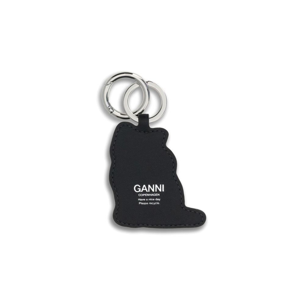 Ganni Blue Recycled Leather Keychain shaped like a cat with GANNI logo, featuring silver ring and clasp, perfect for bags or backpacks.