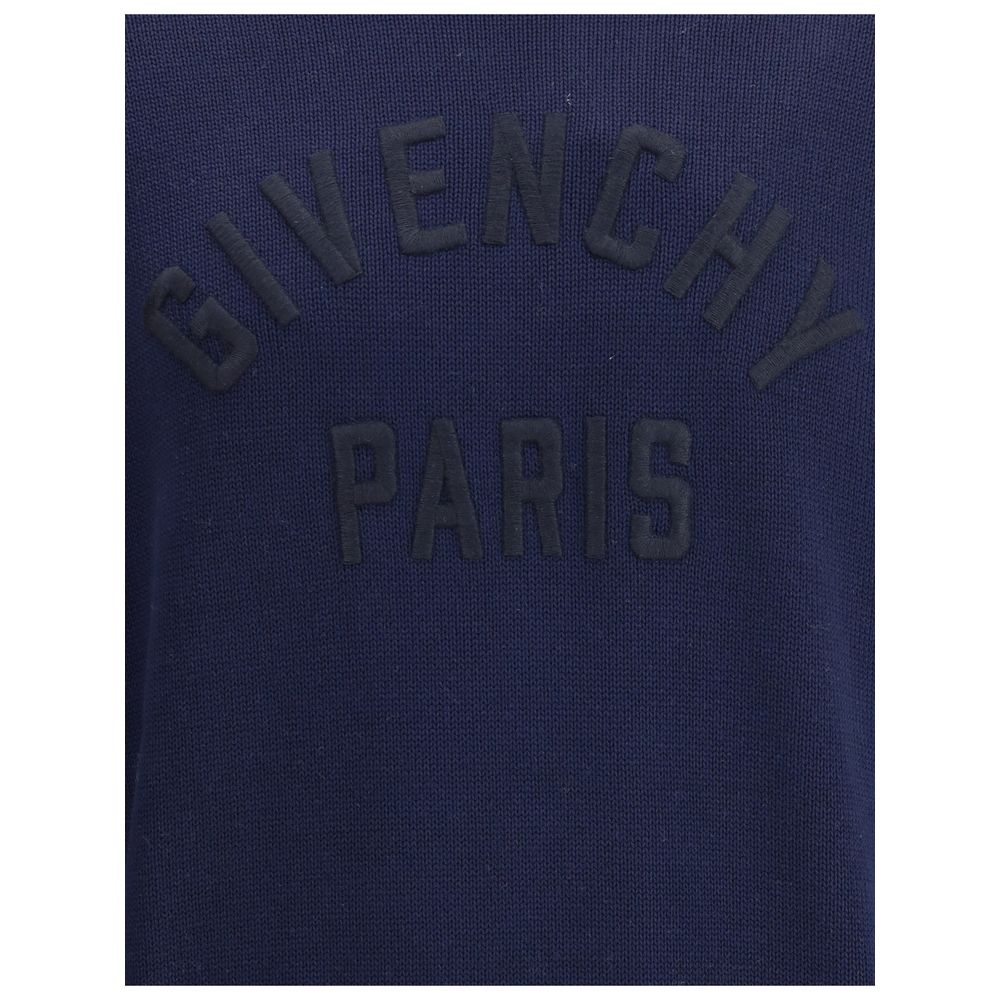 Close-up of black embroidered logo on Givenchy Blue Cotton Sweatshirt with high collar and ribbed hem, showcasing minimalist elegance.