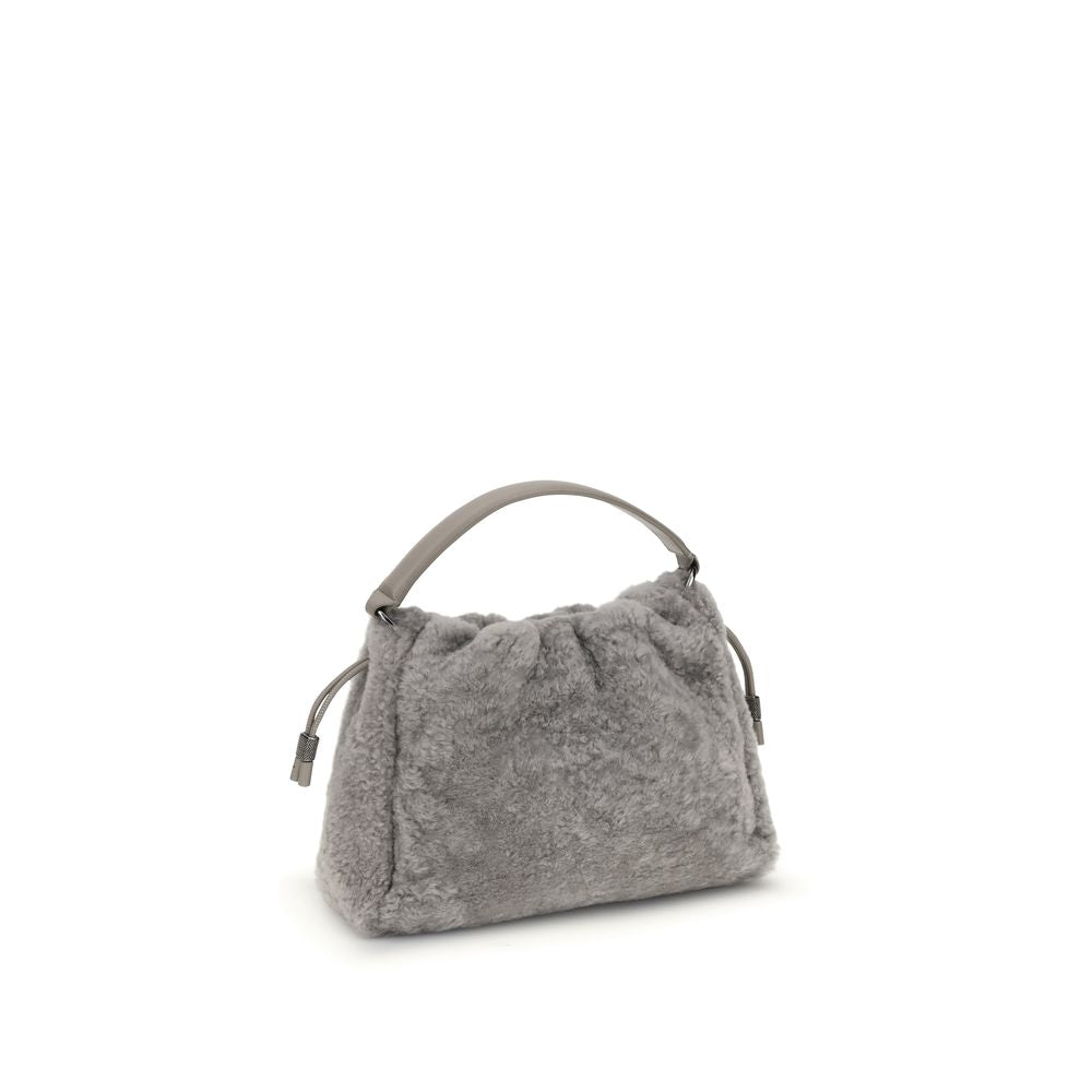 Brunello Cucinelli Gray Fur Shoulder Bag with leather strap and drawstring closure, showcasing elegant design and refined metal details.