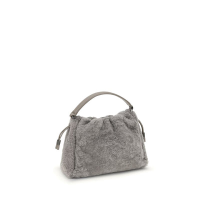 Brunello Cucinelli Gray Fur Shoulder Bag with leather strap and drawstring closure, showcasing elegant design and refined metal details.