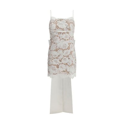 Self-Portrait White Nylon Casual Dress with lace bow, featuring a deep U-shaped back neckline and oversized bow for a dramatic effect.