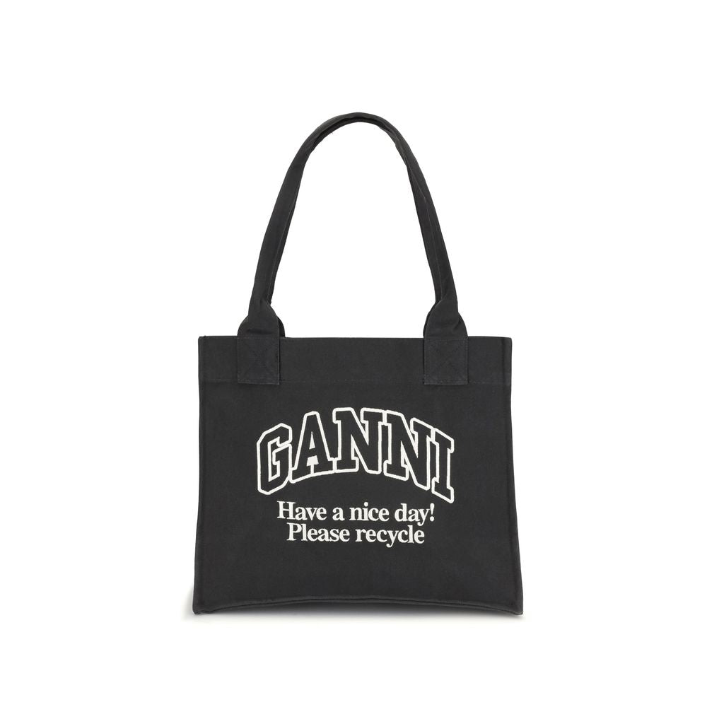 Ganni Black Cotton Shoulder Bag with 'Have a nice day! Please recycle' slogan, eco-friendly recycled cotton tote for everyday use.