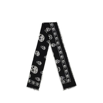 Alexander McQueen Black Modal Scarf with Skull motif, fringed edges, and McQueen logo in black and dark grey, crafted from silk blend.