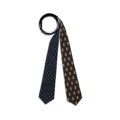 Di Stavnitser Multicolor Cotton Tie featuring a reversible design with classic print, adding versatility to any outfit. 100% cotton.