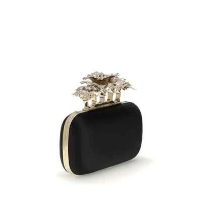 Alexander McQueen Black Silk Clutch Bag with crystal carnation knuckle handle, elegant and versatile accessory with gold-finish chain.