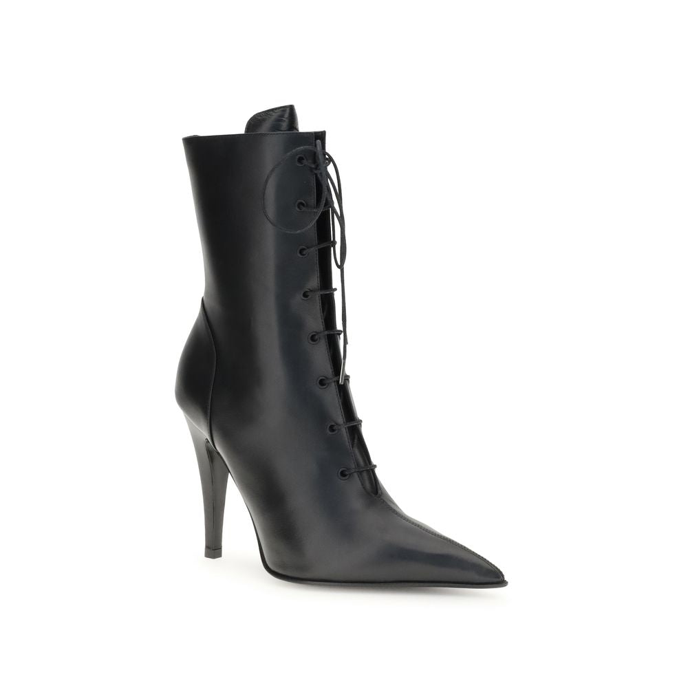 Alexander McQueen Black Calf Leather Bos Taurus Lace-Up Boots with high heel and pointed toe for sophisticated contemporary looks.