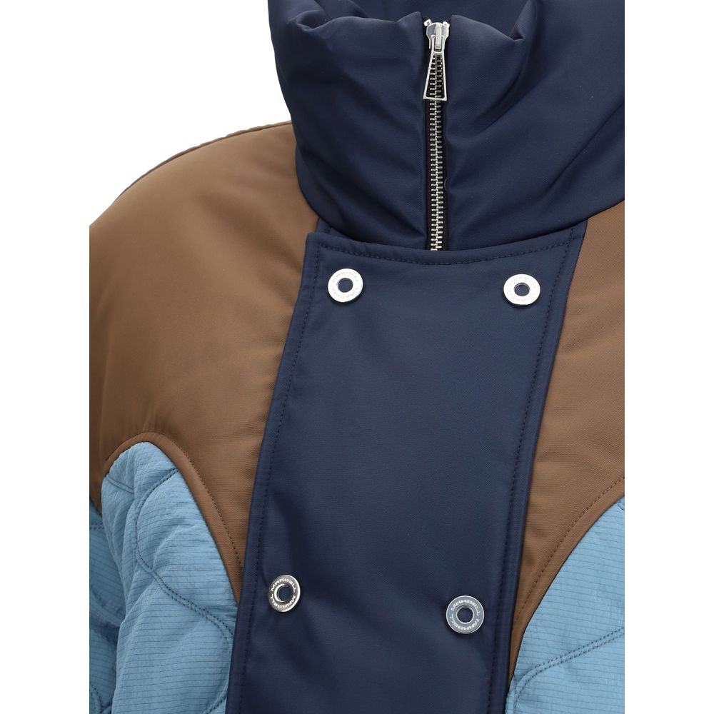 Close-up of MARBELL Light Blue Polyamide Coat showing double-breasted closure with zipper and snap buttons detail.