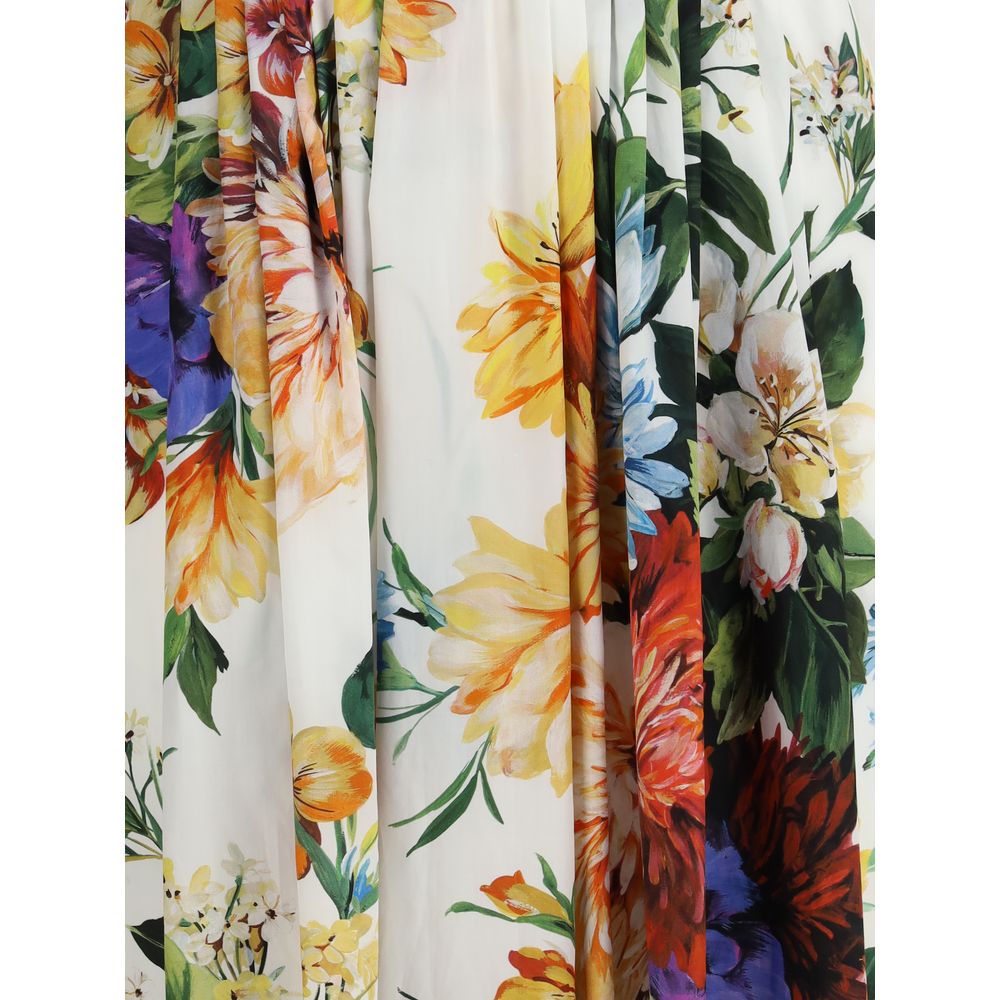 Close-up of Dolce & Gabbana Multicolor Cotton Casual Dress floral print with vibrant flower bouquet design and pleats.
