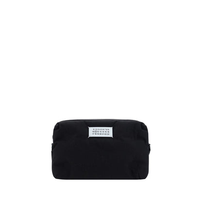 Margiela Black Nylon Shoulder Bag with leather inserts and adjustable strap, front logo, zipper closure, and back pocket. Dimensions 29x29x12.