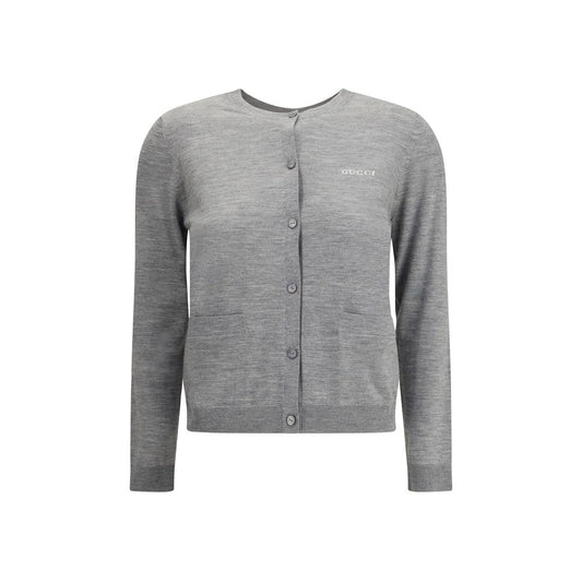 Gucci Gray Cashmere Cardigan with ribbed crew neck, front button closure, two patch pockets, and signature logo, perfect for AW25.