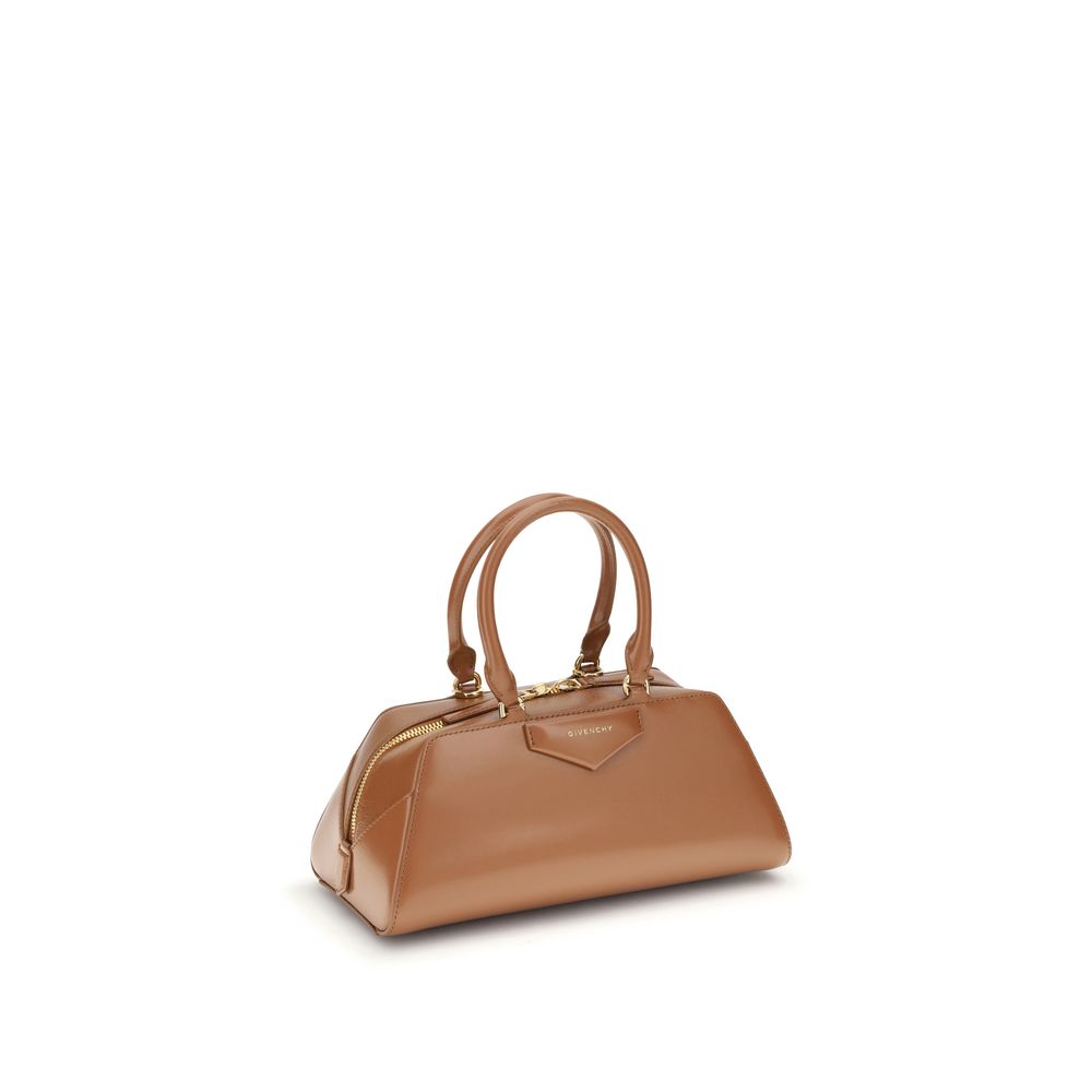 Givenchy Brown Calf Leather Bos Taurus Handbag with structured design and embossed signature, featuring versatile articulated handles.